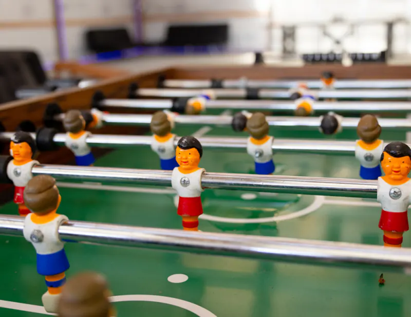 Foosball table in the clubhouse game room at Lake Hudson Resort